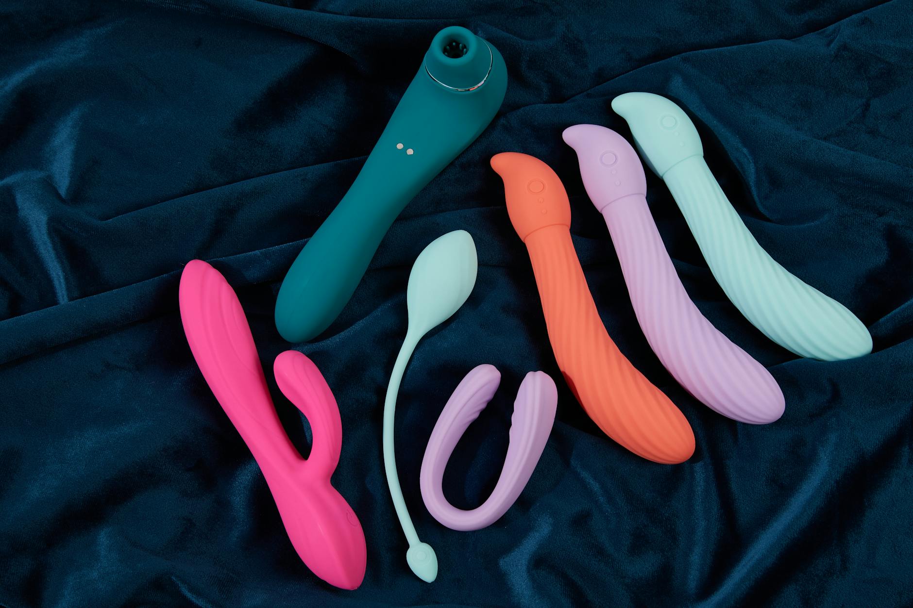 A couple exploring intimacy together with a vibrator, representing modern approaches to pleasure at any age