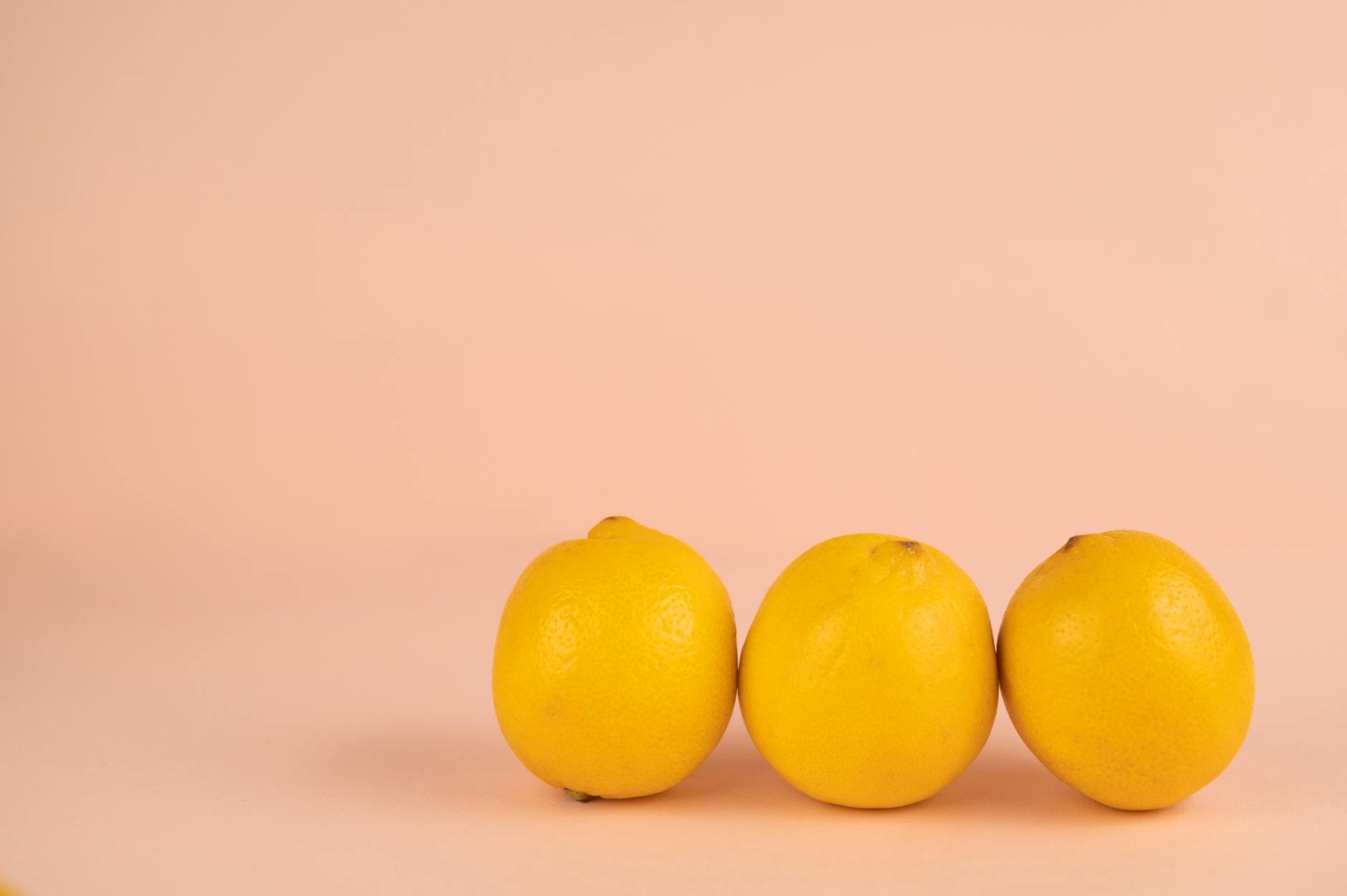 Colorful vibrators arranged on a bright yellow surface, representing modern couple intimacy